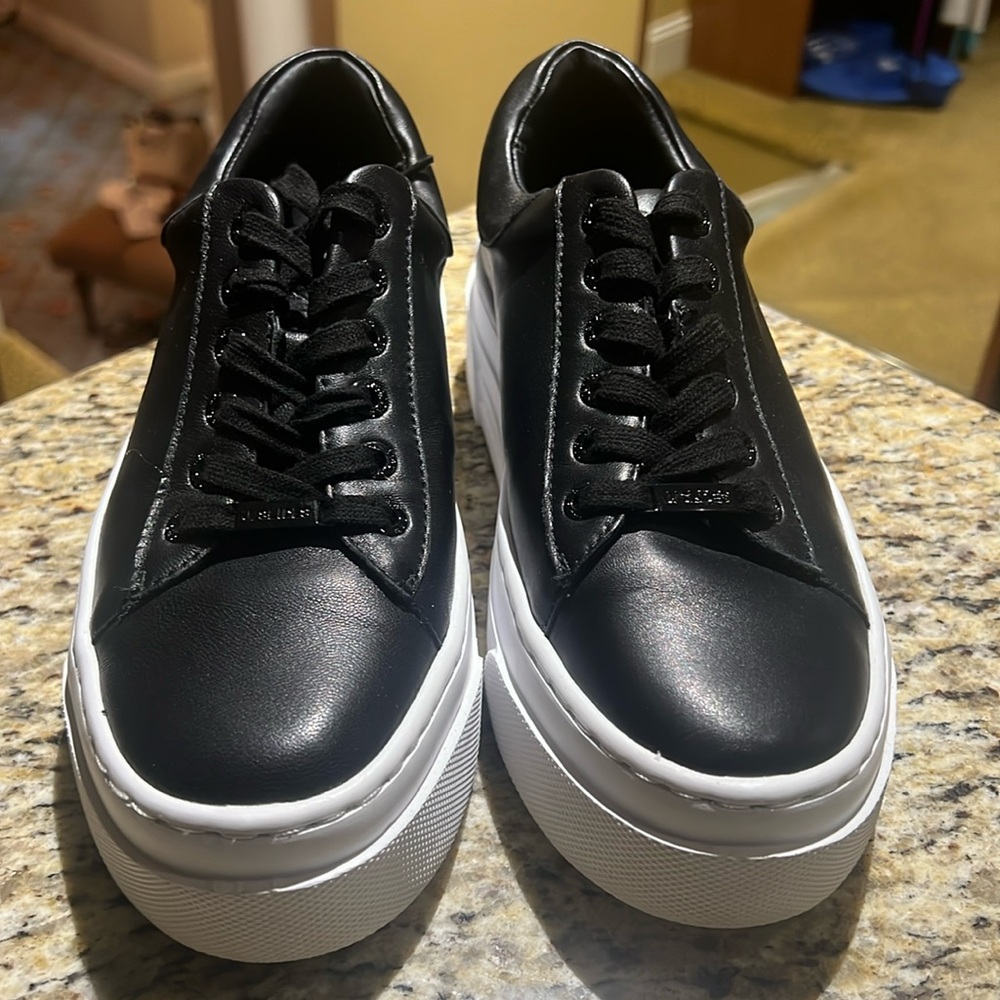 7 1/2 black leather J Slide lace up sneaker  2”platform. Pristine condition.